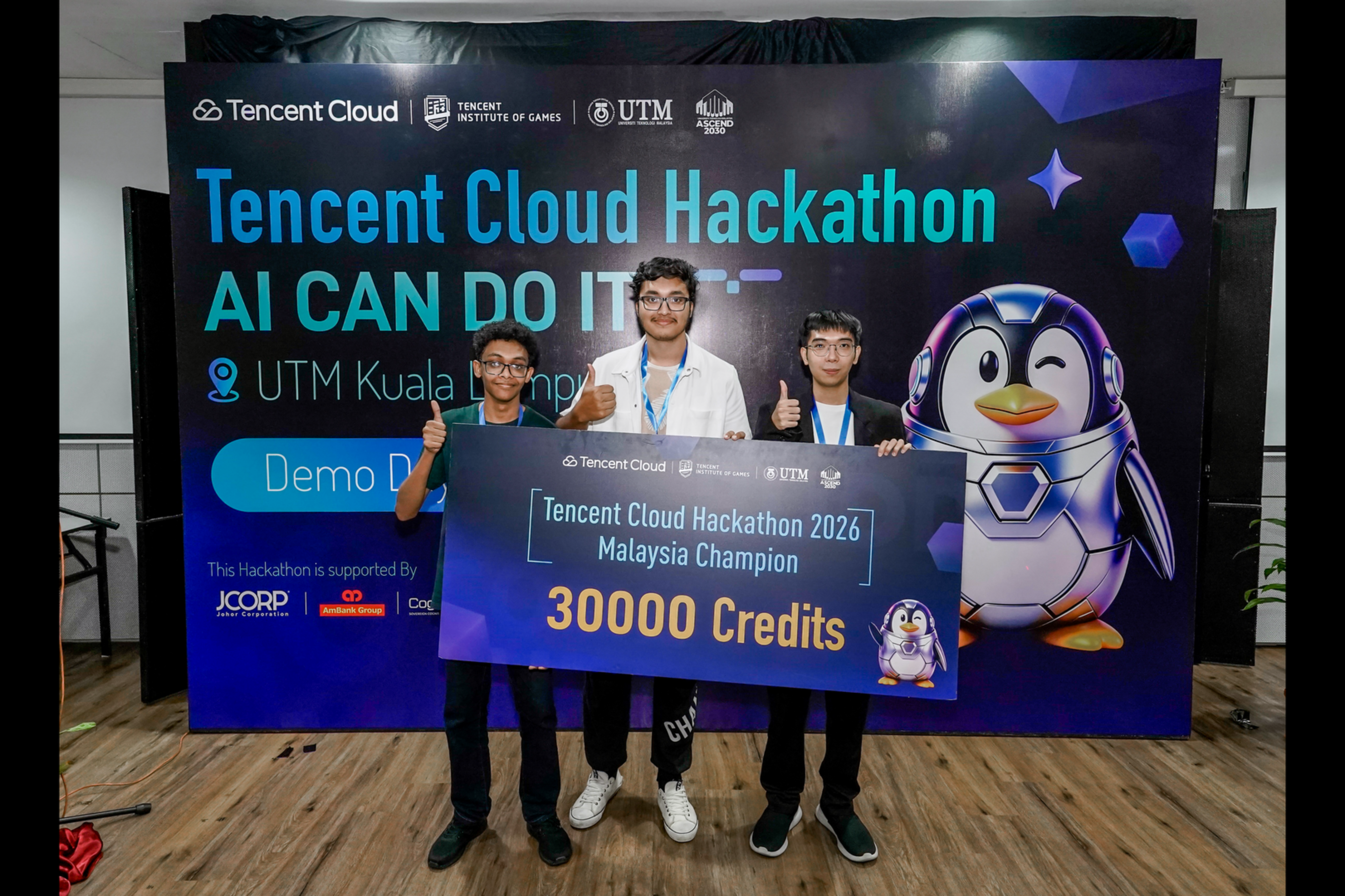 Malaysia representatives Ahmad Suliman and Rahbab Chowdhury of THRESHOLD with the representative from Malaysia's other winning team; all three qualified for the Tencent Cloud Hackathon global final in Shenzhen.